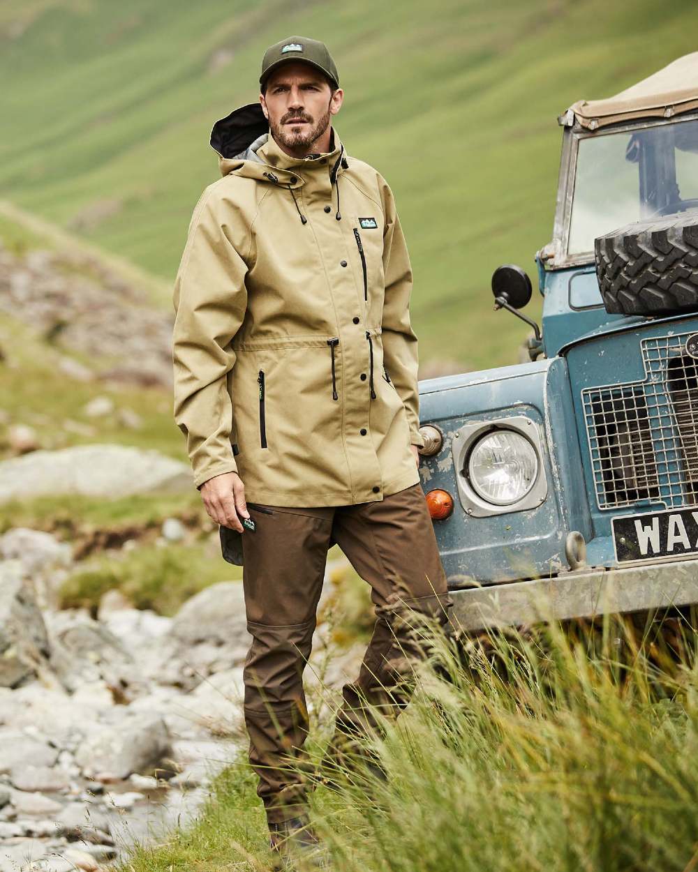 Faded Teak Coloured Ridgeline Mens Monsoon Nunatak Jacket On A Hills Background #colour_faded-teak