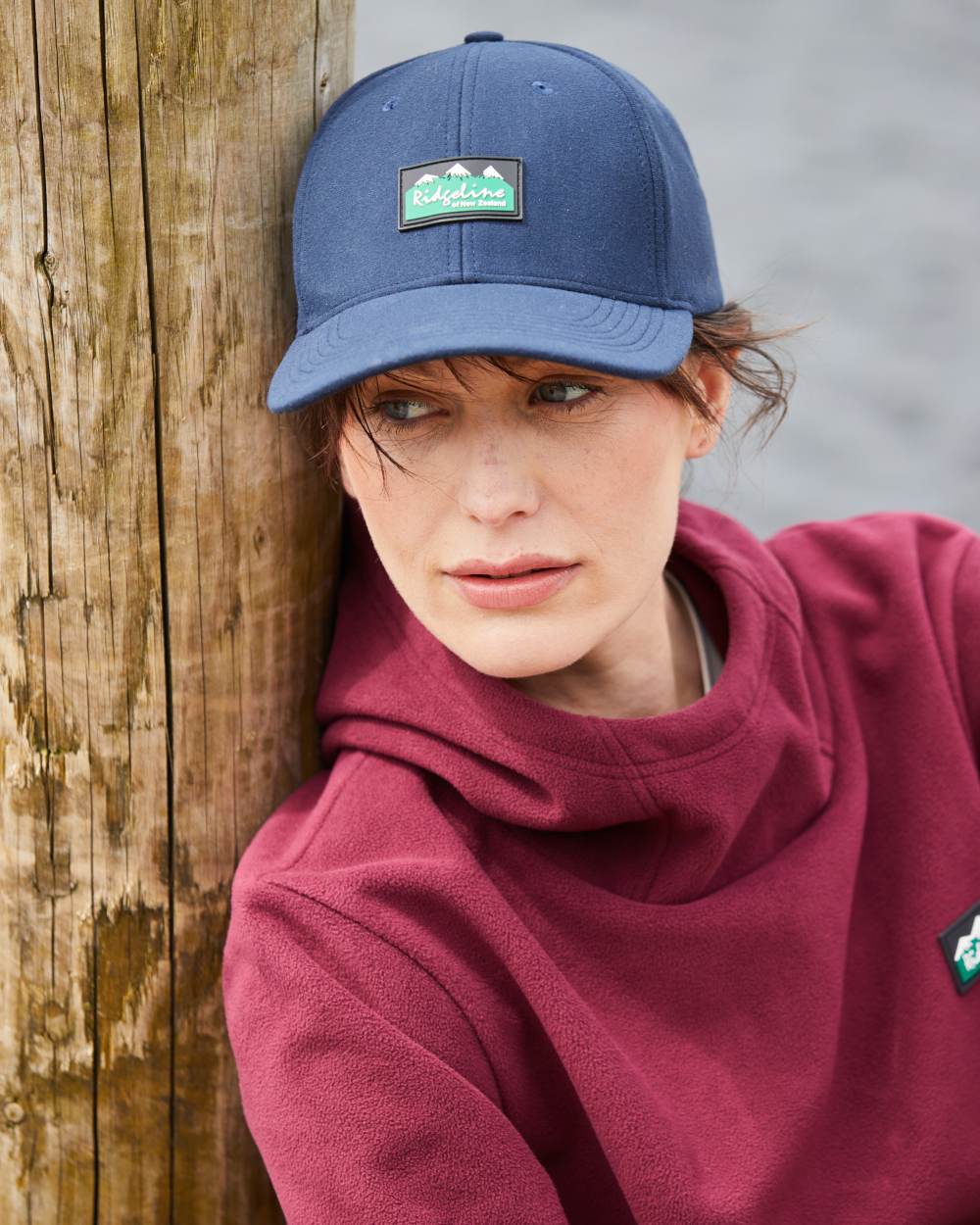 Navy Coloured Ridgeline Monsoon Classic Cap On A Blurry Background #colour_navy
