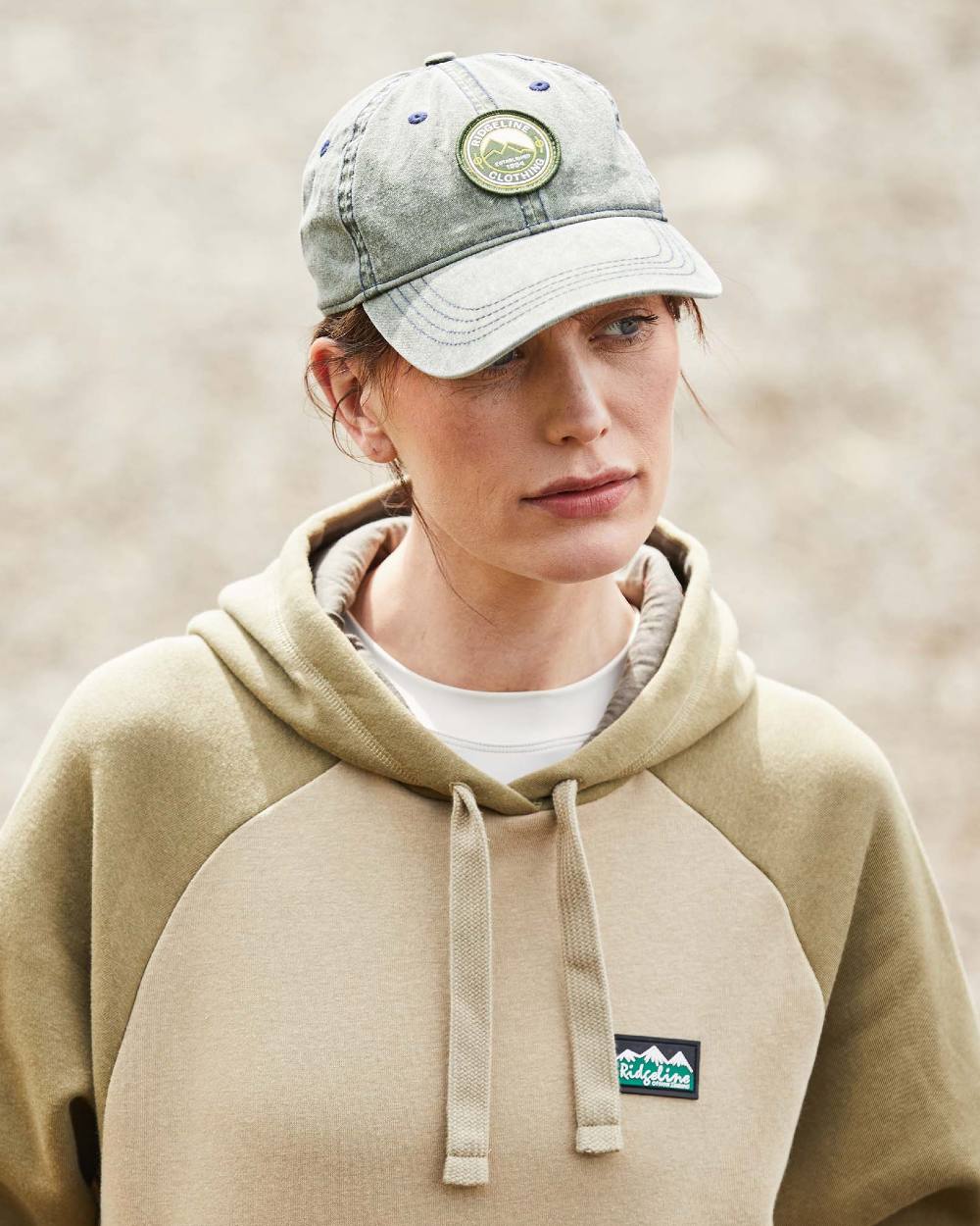 Olive Wash Coloured Ridgeline Original Truckie Cap On A Blurry Background #colour_olive-wash