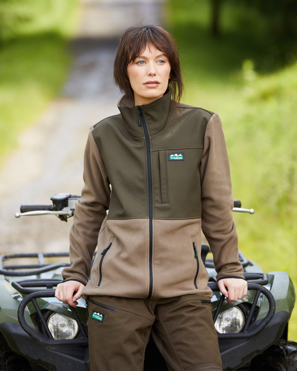 Light Bark Coloured Ridgeline Womens Hybrid Jacket On A Street Background #colour_light-bark