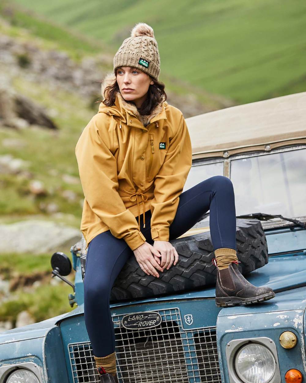 Ochre Coloured Ridgeline Womens Monsoon Nordic Smock On A Hill Background #colour_ochre
