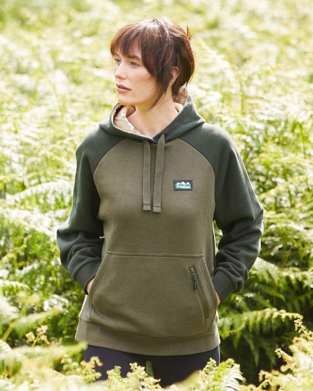 Ivy Green Coloured Ridgeline Womens North Island Hoodie On A Forest Background #colour_ivy-green