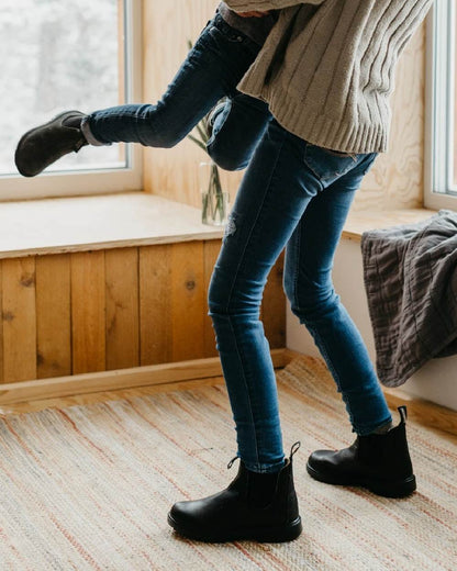 Black coloured Blundstone 510 Original Voltan Black Leather Boots on house background #colour_black