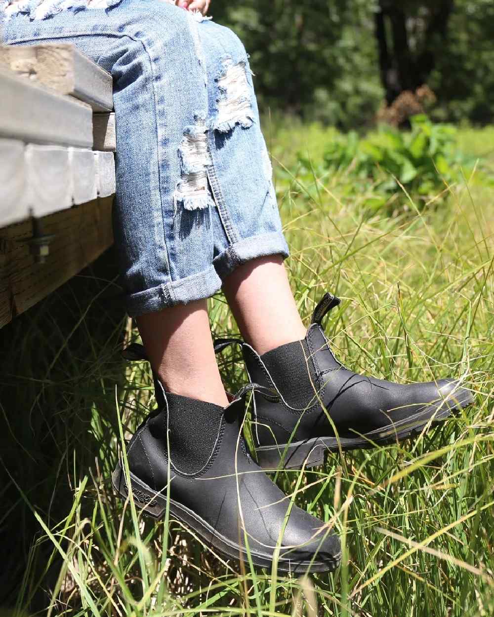Black coloured Blundstone 510 Original Voltan Black Leather Boots on grass background #colour_black