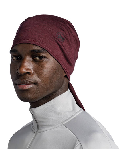 Garnet Coloured Buff Merino Lightweight Neck Warmer on white background #colour_garnet