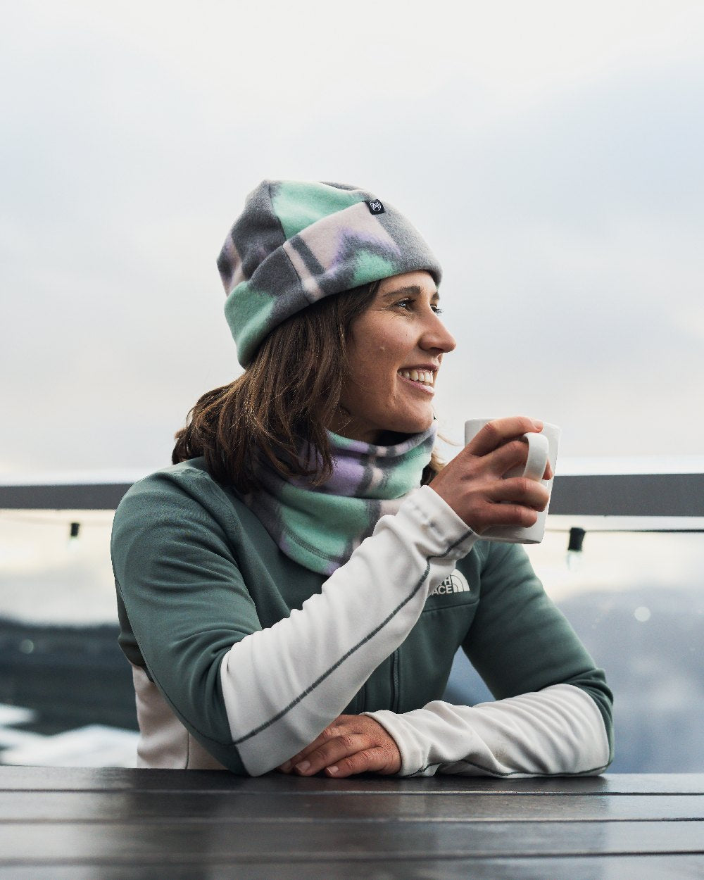 Cusha Multi Coloured Buff Polar Prints Beanie on terrace background #colour_cusha-multi
