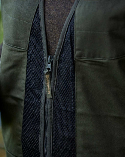 Timber coloured Deerhunter Atlas Mesh Shooting Waistcoat on blurry background #colour_timber