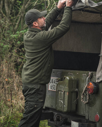 Timber coloured Deerhunter Atlas Trousers on forest background #colour_timber