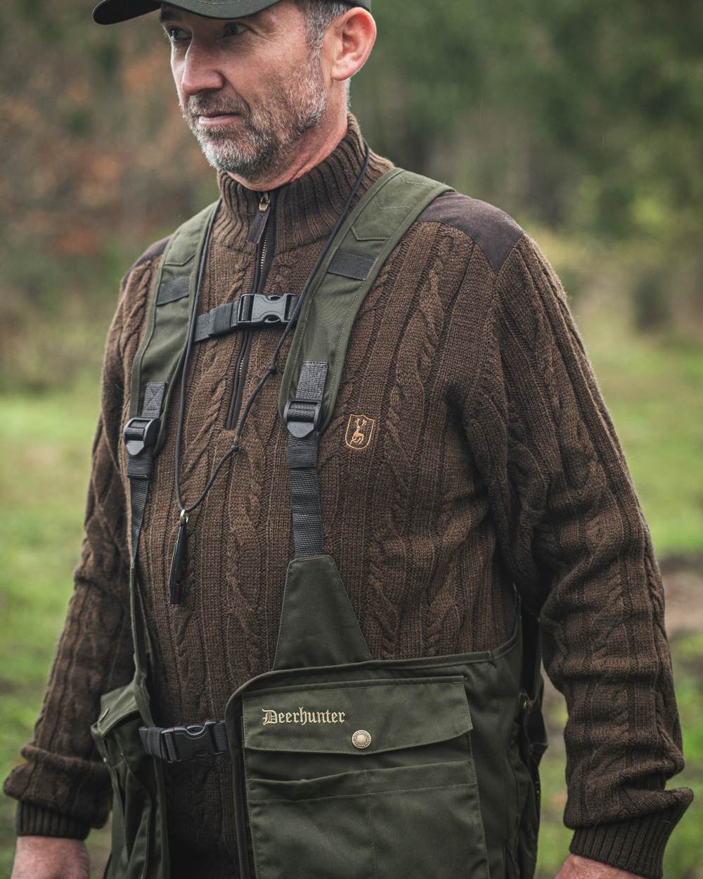 Timber coloured Deerhunter Atlas Waistcoat on forest background #colour_timber