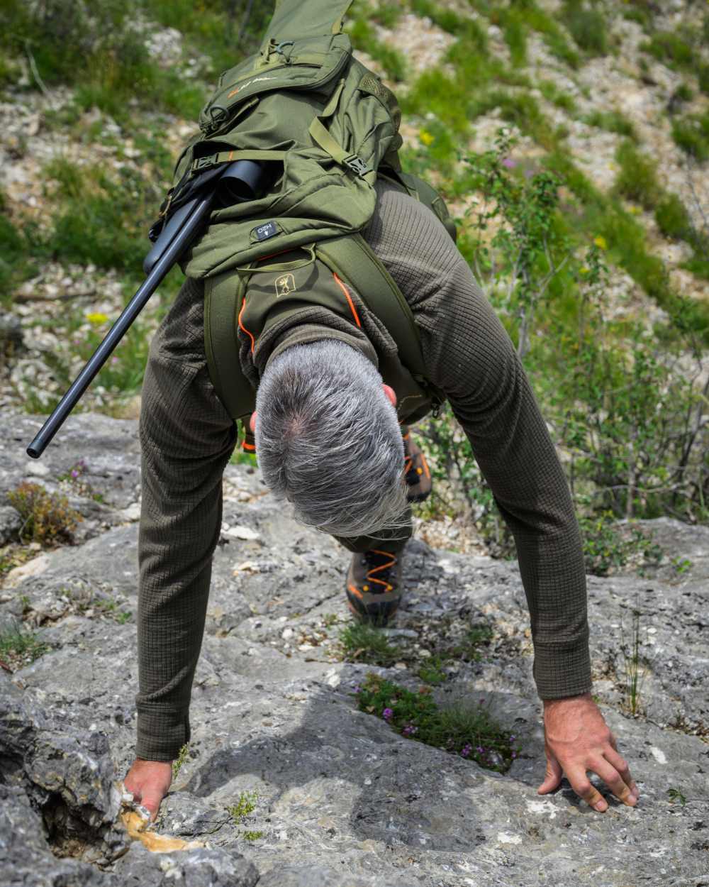 Forest Green coloured Deerhunter Chamois Full Zip Fleece Jacket on forest background #colour_forest-green