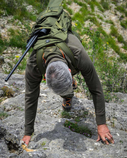 Forest Green coloured Deerhunter Chamois Full Zip Fleece Jacket on forest background #colour_forest-green