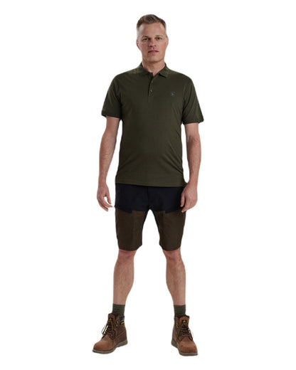 Green coloured Deerhunter Christian Polo Shirt on white background #colour_green