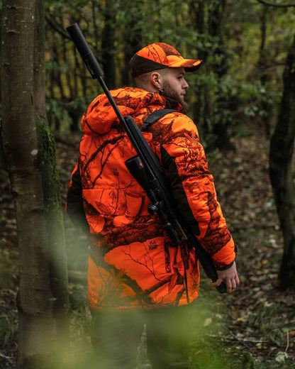 Realtree Edge Orange Coloured Deerhunter Eagle Winter Jacket On A Forest Background #colour_realtree-edge-orange