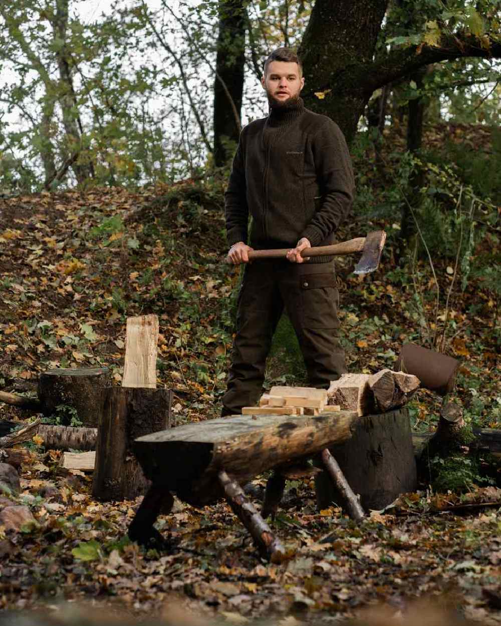 Tarmac Green Coloured Deerhunter Eagle Winter Trousers On A Forest Background #colour_tarmac-green