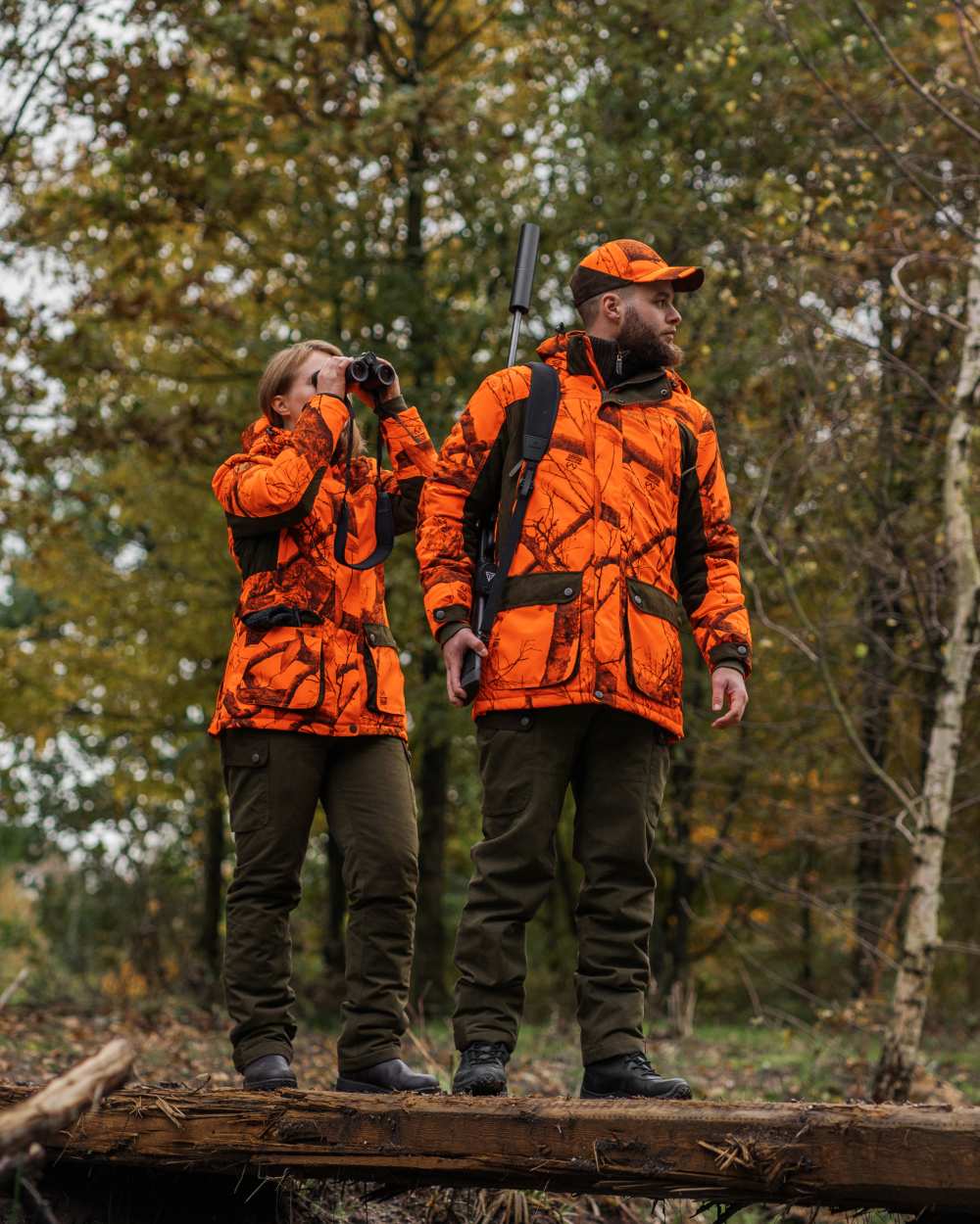 Tarmac Green Coloured Deerhunter Eagle Winter Trousers On A Forest Background #colour_tarmac-green