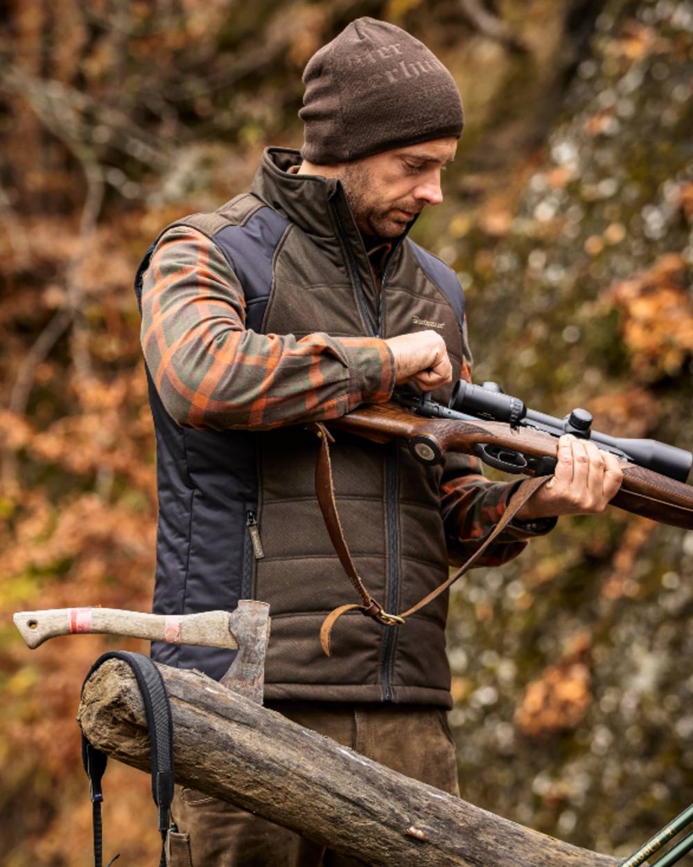 Walnut coloured Deerhunter Embossed Logo Beanie on forest background #colour_walnut