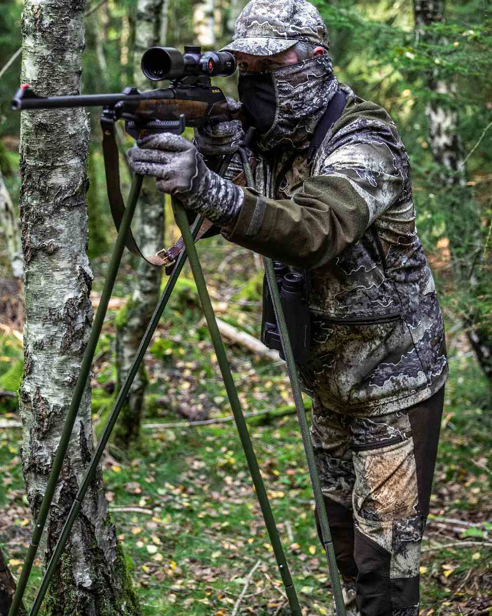 Realtree Excape coloured Deerhunter Excape Light Trousers on  forest background #colour_realtree-excape