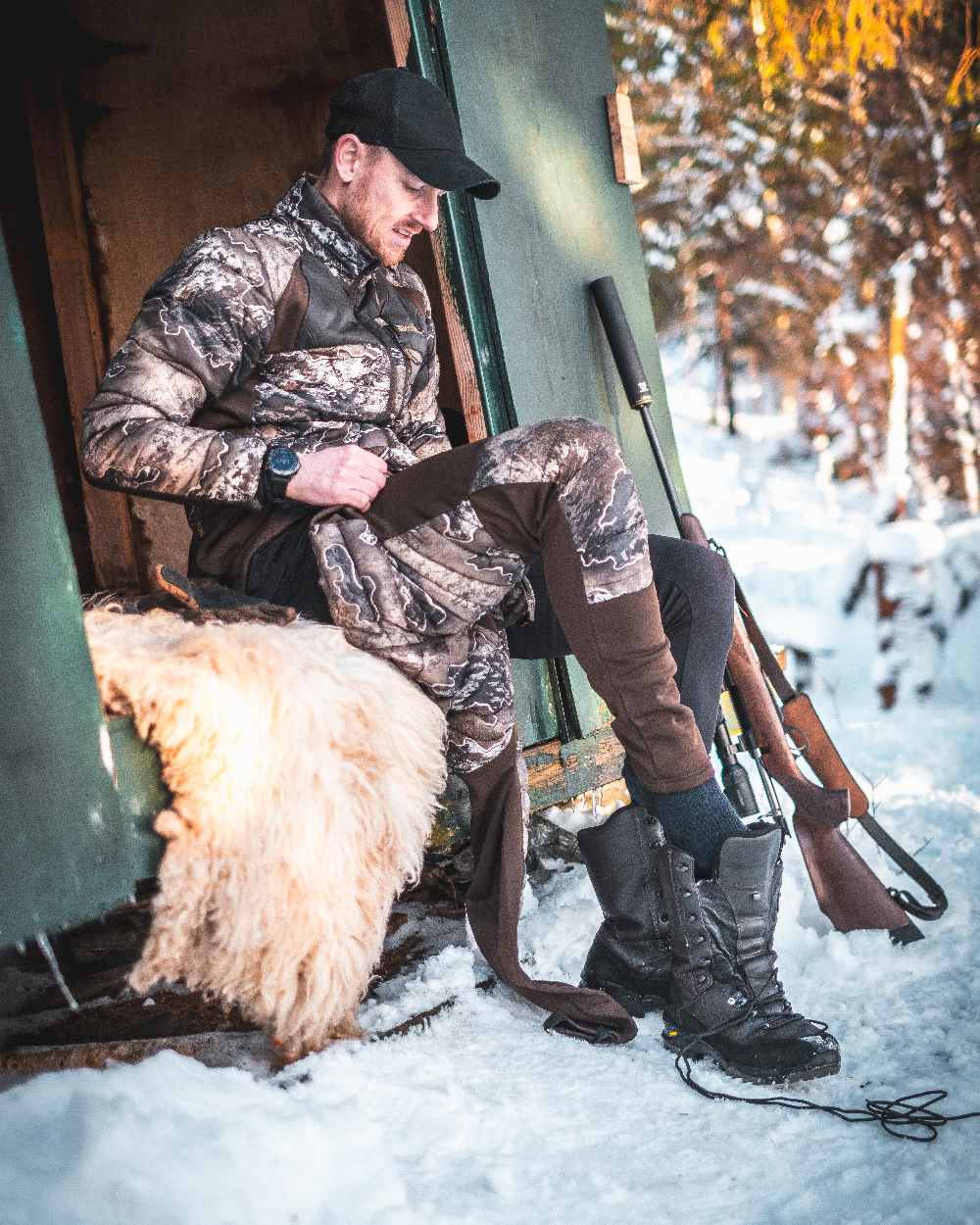Realtree Excape coloured Deerhunter Excape Quilted Trousers on snow background #colour_realtree-excape