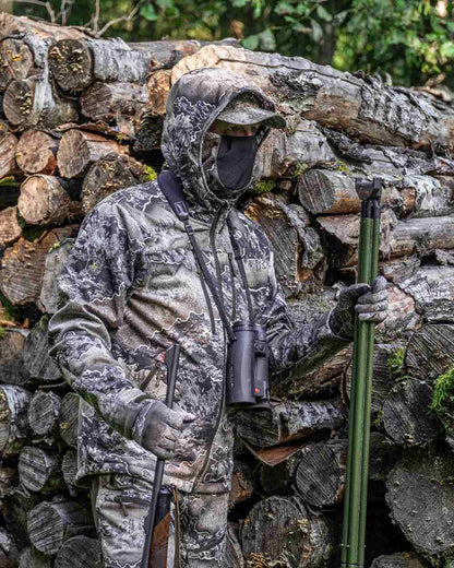 Realtree Excape coloured Deerhunter Excape Softshell Jacket on wood background #colour_realtree-excape
