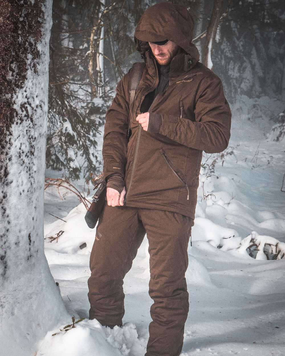 Art Green coloured Deerhunter Excape Winter Waterproof Jacket on snow background #colour_art-green