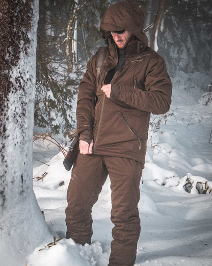 Art Green coloured Deerhunter Excape Winter Waterproof Jacket on snow background #colour_art-green