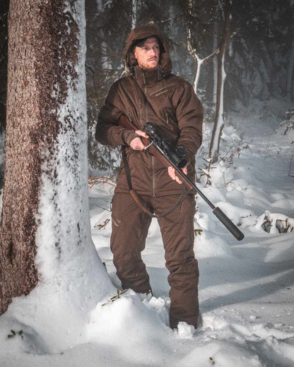 Art Green coloured Deerhunter Excape Winter Waterproof Jacket on snow background #colour_art-green