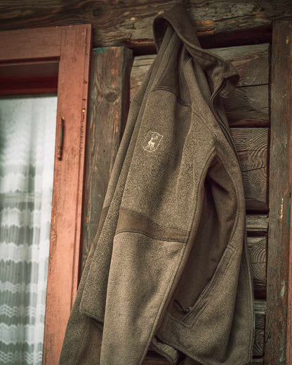 Graphite Green coloured Deerhunter Gamekeeper Bonded Fleece Jacket on wooden background #colour_graphite-green