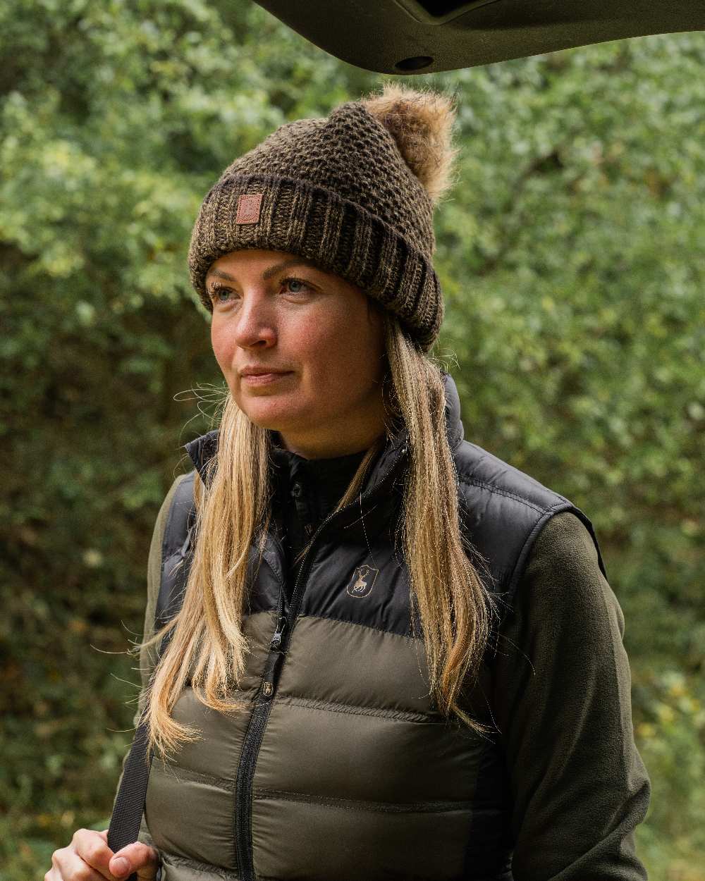 Art Green coloured Deerhunter Ladies Knitted Hat on blurry background #colour_art-green