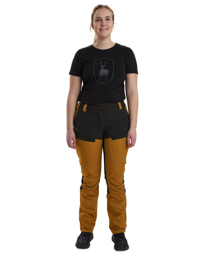 Bronze coloured Deerhunter Lady Ann Trousers on white background #colour_bronze