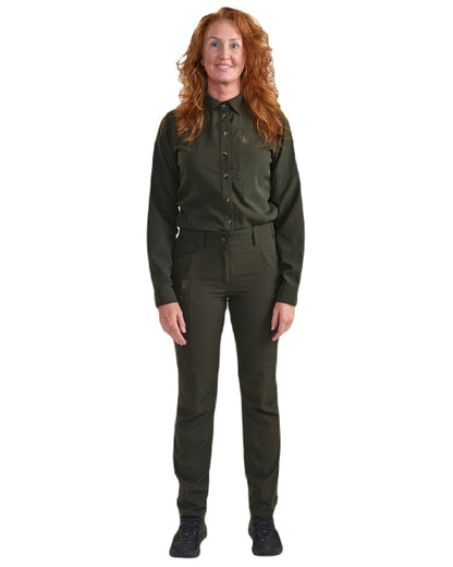 Forest Green coloured Deerhunter Lady Canopy Trousers on white background #colour_forest-green