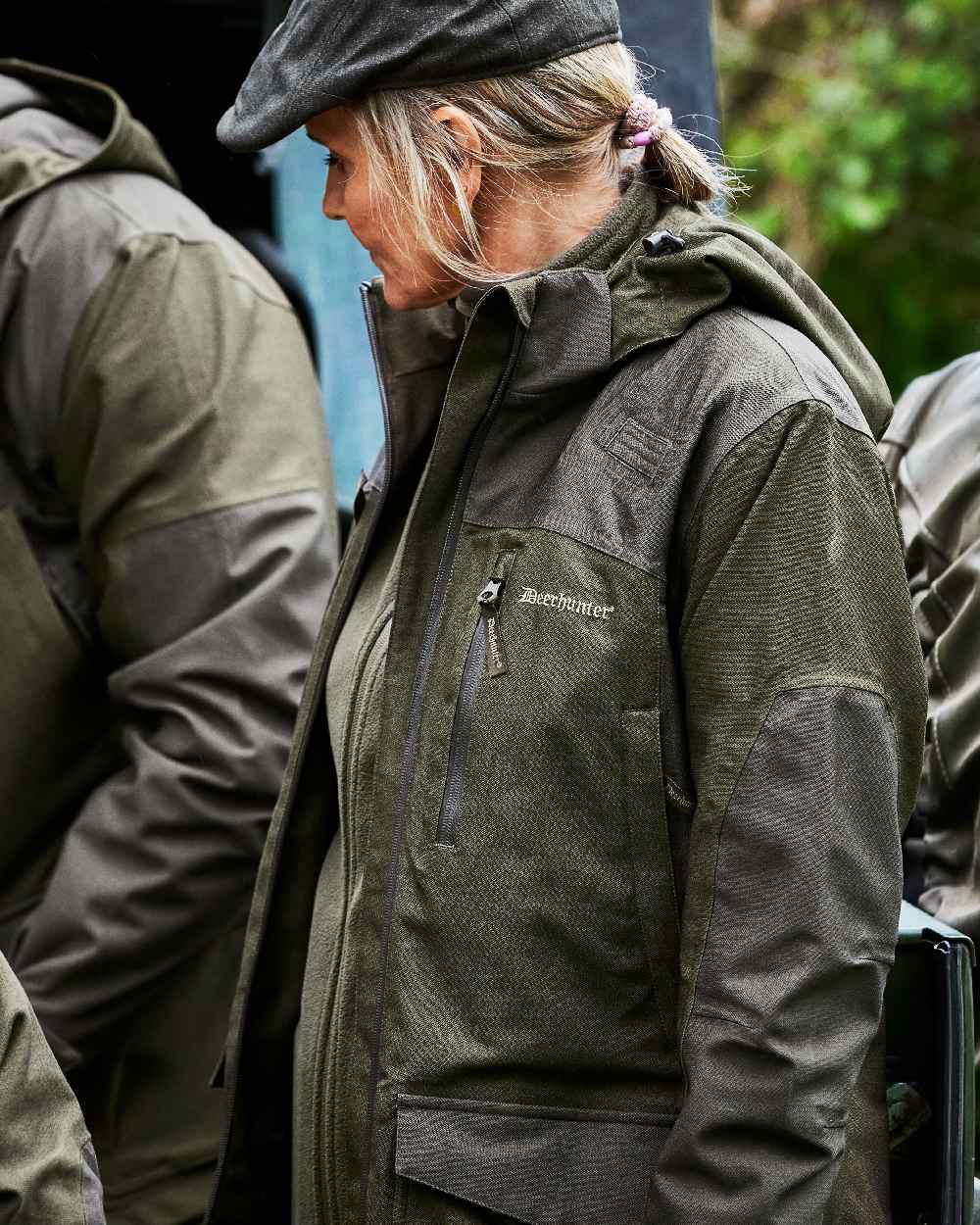 Olive Night Melange Coloured Deerhunter Lady Chasse Jacket on car background #colour_olive-night-melange