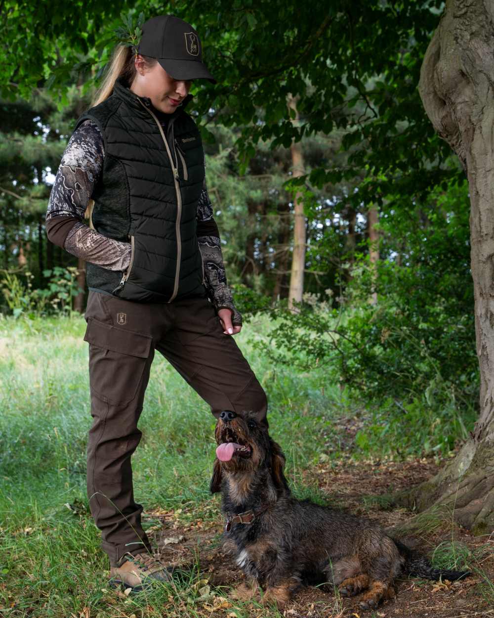 Forest Ember coloured Deerhunter Lady Moor Padded Jacket on forest background #colour_forest-ember