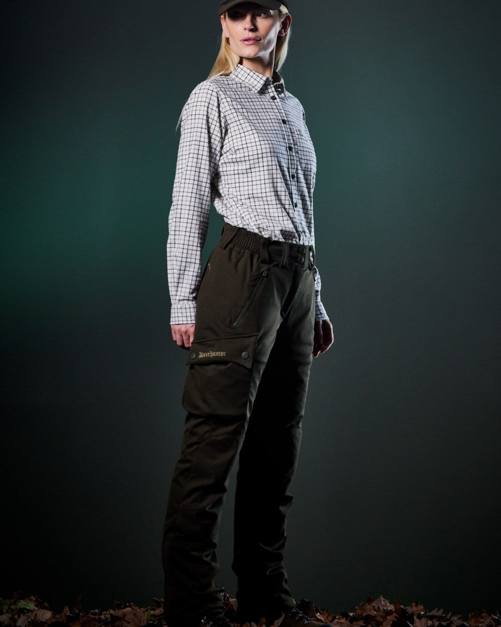 Art Green coloured Deerhunter Lady Muflon Pro Trousers on forest background #colour_art-green