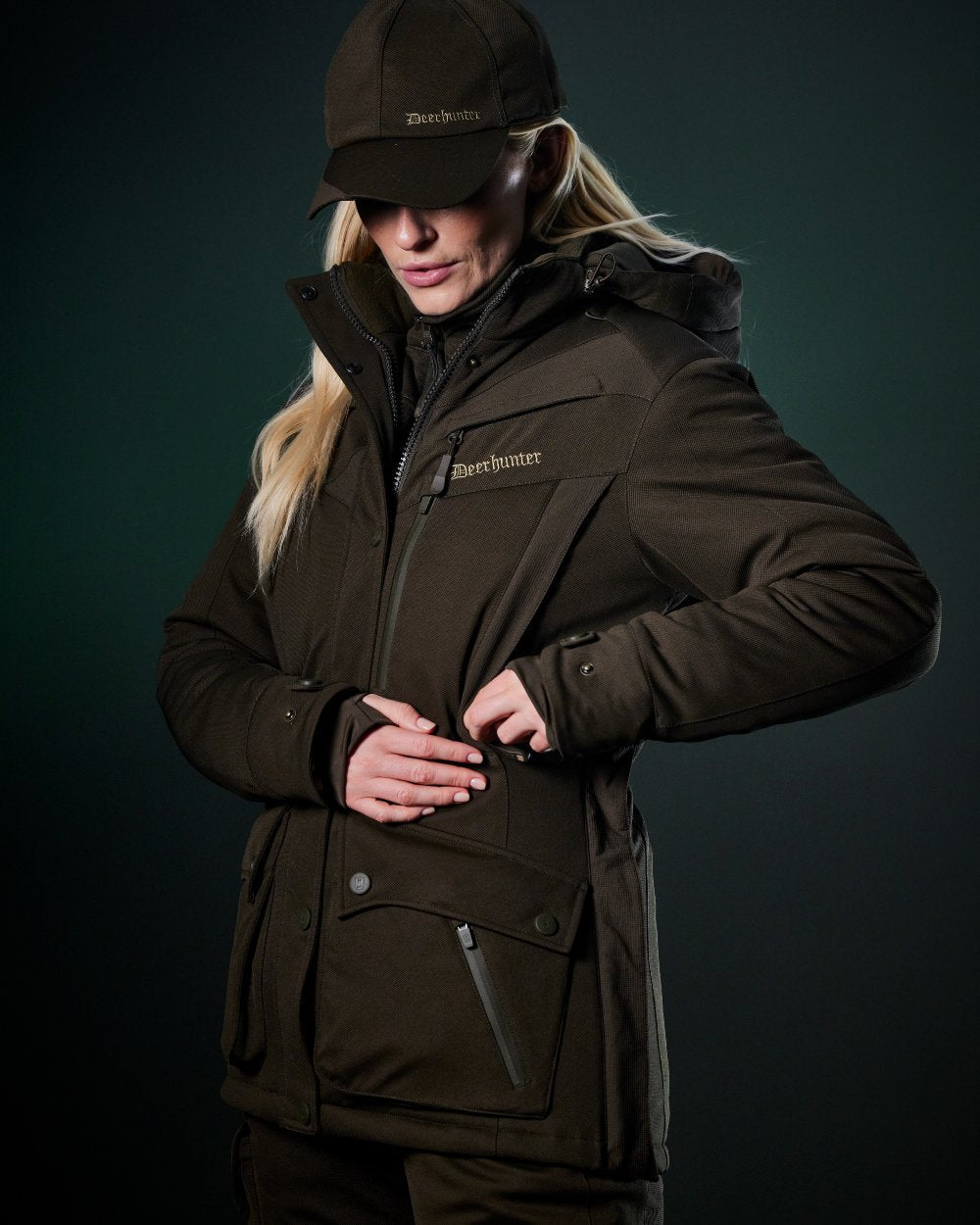 Art Green coloured Deerhunter Lady Muflon Pro Winter Jacket on forest background #colour_art-green