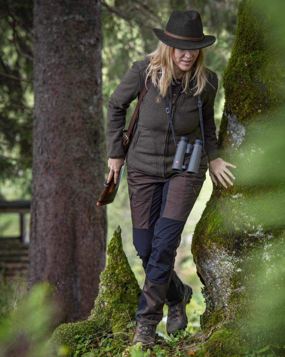Green Orange coloured Deerhunter Lady Pam Reversible Bonded Fleece Jacket on forest background #colour_green-orange