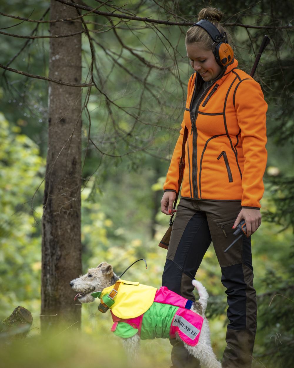 Green Orange coloured Deerhunter Lady Pam Reversible Bonded Fleece Jacket on forest background #colour_green-orange