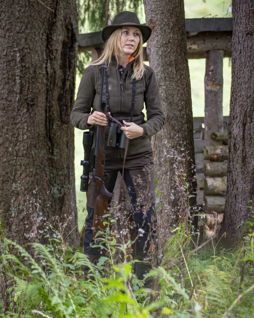 Green Orange coloured Deerhunter Lady Pam Reversible Bonded Fleece Jacket on forest background #colour_green-orange