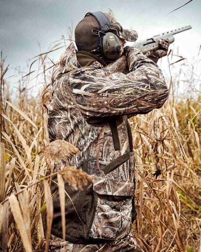 Realtree Max-5 coloured Deerhunter Mallard Trousers on grassy background #colour_realtree-max-5