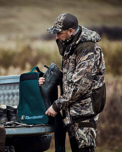 Realtree Max-5 coloured Deerhunter Mallard Trousers on blurry background #colour_realtree-max-5