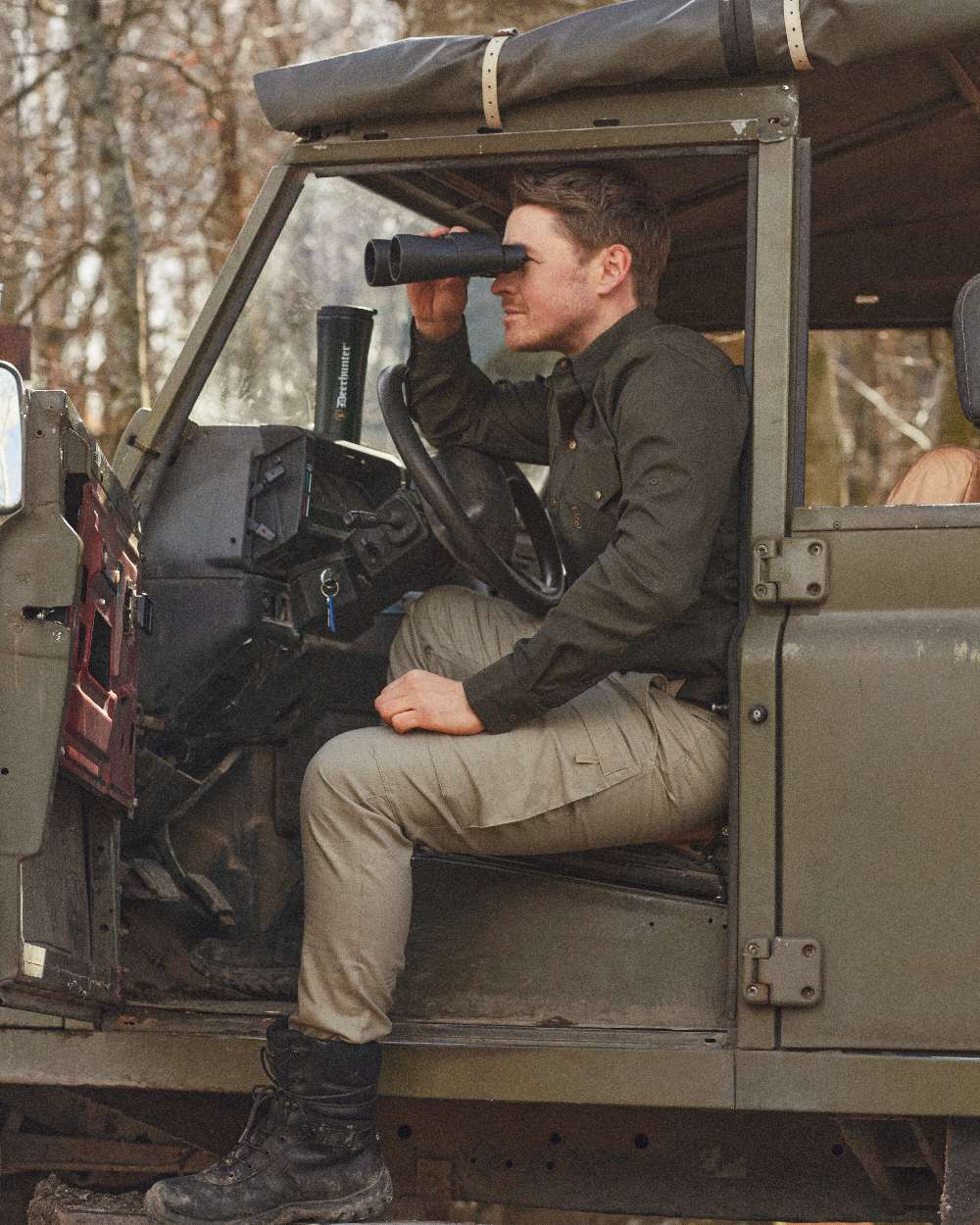 Forest Green coloured Deerhunter Matobo Shirt on jeep background #colour_forest-green