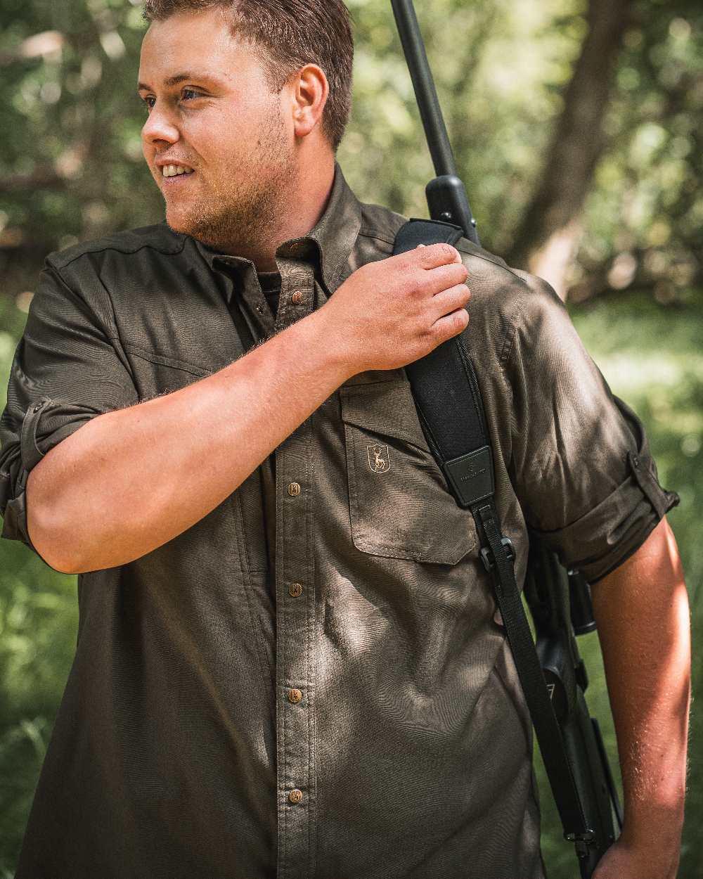 Forest Green coloured Deerhunter Matobo Shirt on blurry background #colour_forest-green