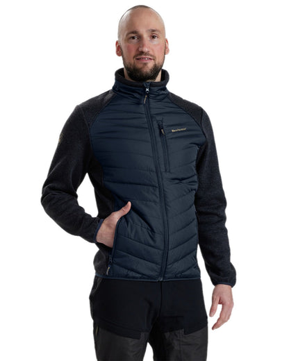 Dark Blue Coloured Deerhunter Moor Padded Jacket with Knitted Sleeves on white background #colour_dark-blue