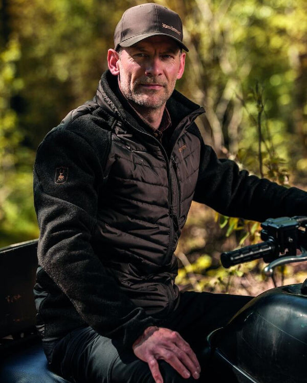 Timber Coloured Deerhunter Moor Padded Jacket with Knitted Sleeves on blurry background #colour_timber