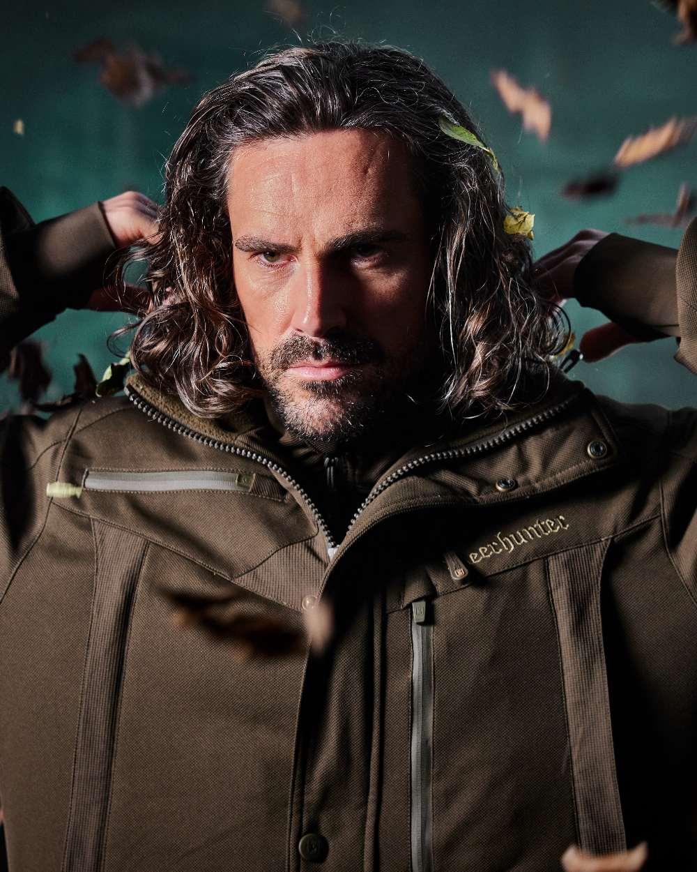 Art Green coloured Deerhunter Mens Muflon Pro Jacket on forest background #colour_art-green