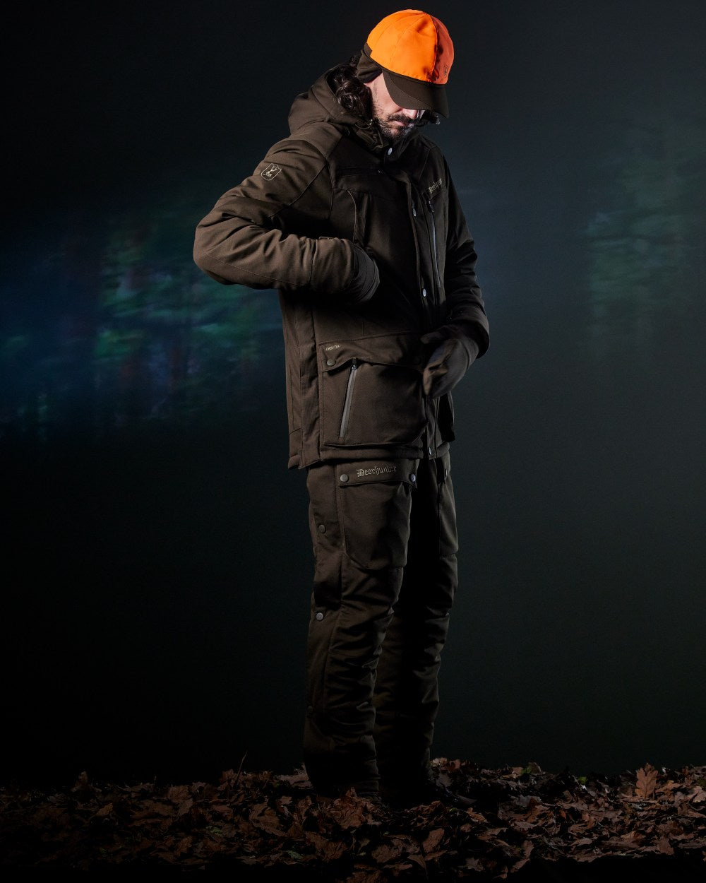 Art Green coloured Deerhunter Mens Muflon Pro Winter Jacket on forest background #colour_art-green