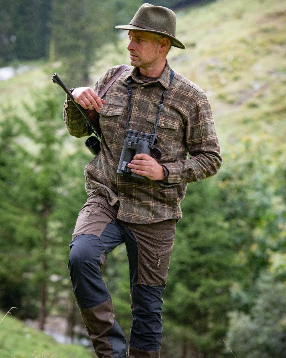 Fallen Leaf Coloured Deerhunter Rogaland Contrast Stretch Trousers on forest background #colour_fallen-leaf