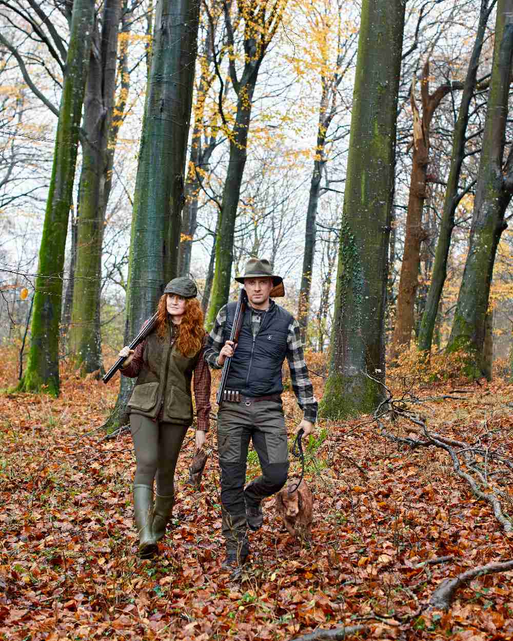 Fallen Leaf Coloured Deerhunter Rogaland Contrast Stretch Trousers on forest background #colour_fallen-leaf