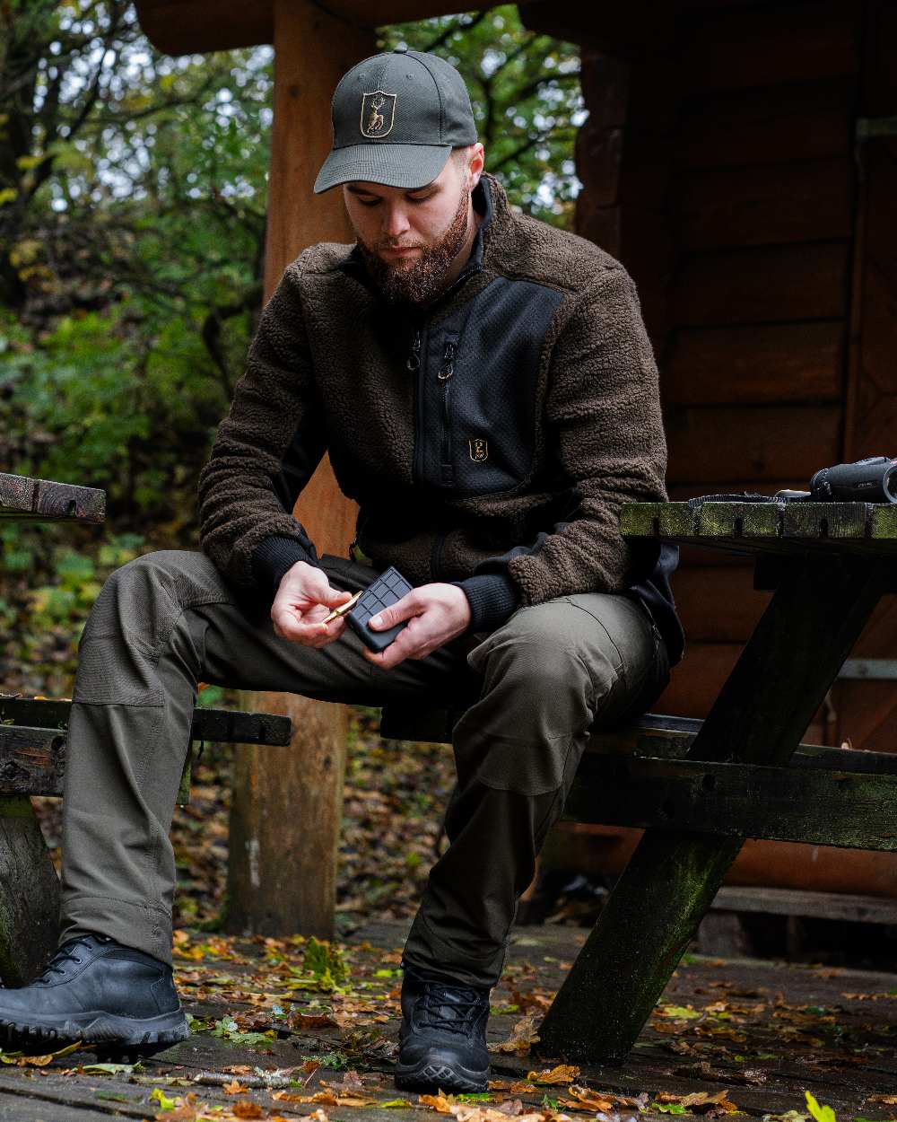Timber coloured Deerhunter Shield Cap on forest background #colour_timber