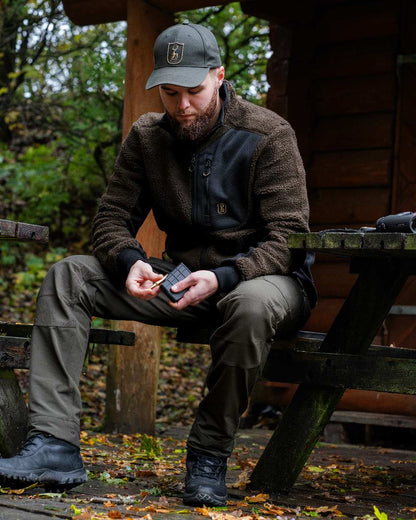 Timber coloured Deerhunter Shield Cap on forest background #colour_timber