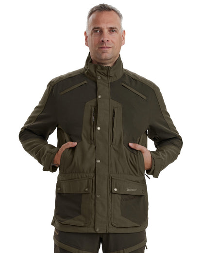 Palm Green coloured Deerhunter Strike Extreme Jacket on white background #colour_palm-green
